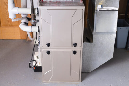 Double stage gas furnace in the basement in Anoka