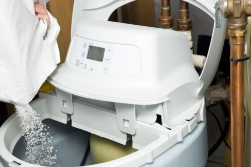 Adding salt to a water softener in Anoka, MN