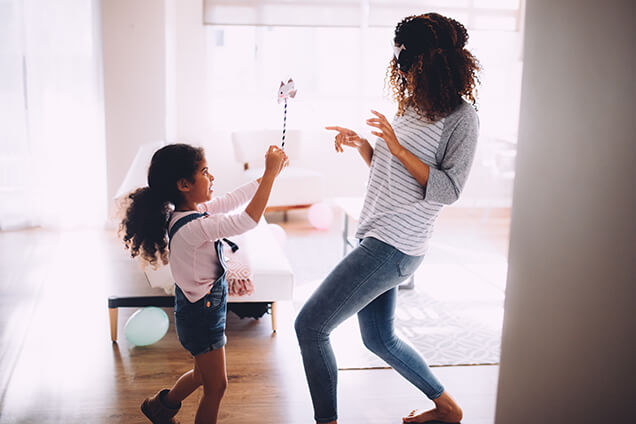 Mom and daughter playing